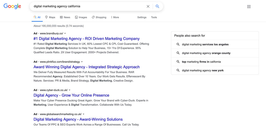 A screenshot of the Google SERPs showing a variety of digital marketing agency PPC ads